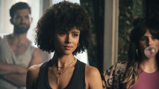 Nathalie Emmanuel stands confidently in front of Stuart Martin and Ruby O. Fee in Army Of Thieves.