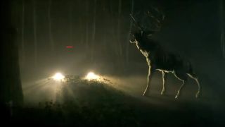 a deer and headlights at night in Bambi: The Reckoning teaser trailer