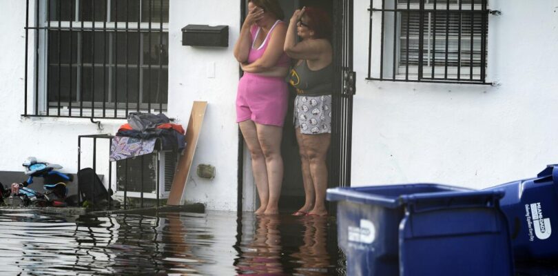 Stalled cars in flooded streets leave South Florida looking like a scene from a zombie movie – Los Angeles Times