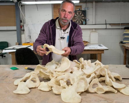 Nick Woolley files the edges of fake pelvic bones at db Props.
