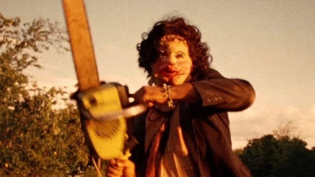 Leatherface holding a chainsaw.