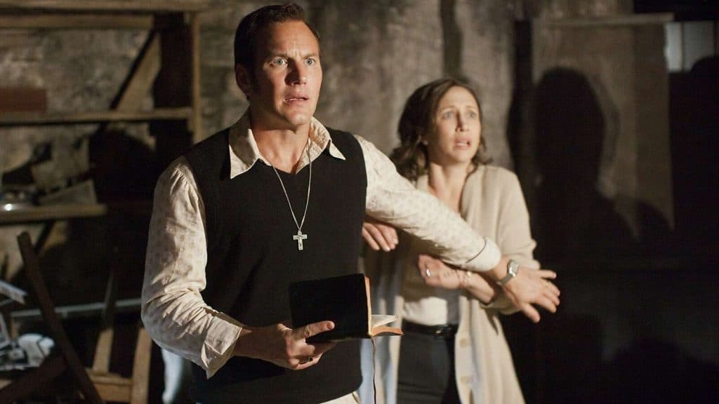 Ed and Lorraine Warren looking terrified in The Conjuring.