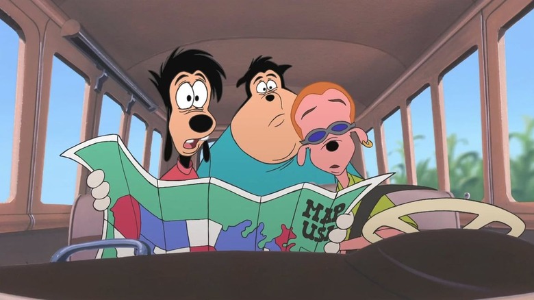 Cartoon dog character Max holding a map in car alongside P.J. and Bobby in An Extremely Goofy Movie