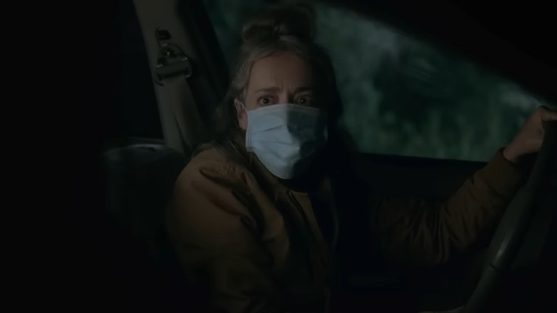 Jane Adams as Pamela, wearing a facemask, in Sick
