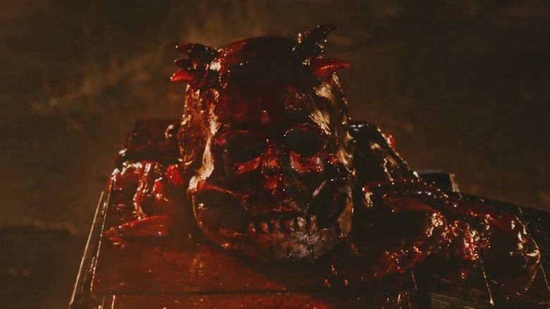 The bloody skull-wearing killer in Skull: The Mask