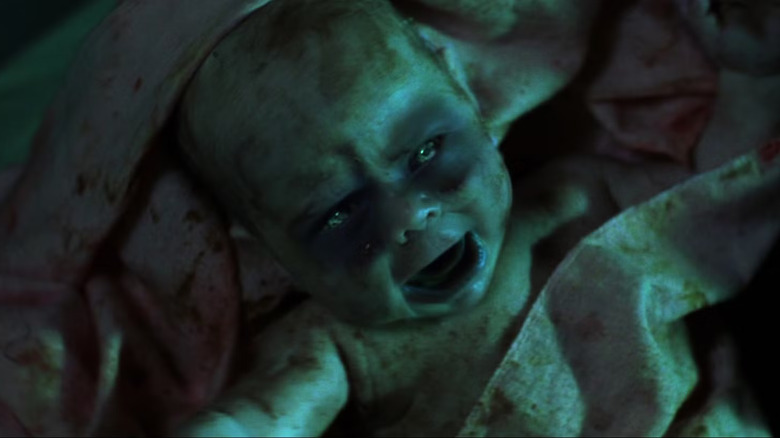 A zombie baby gives his first cries in Dawn of the Dead