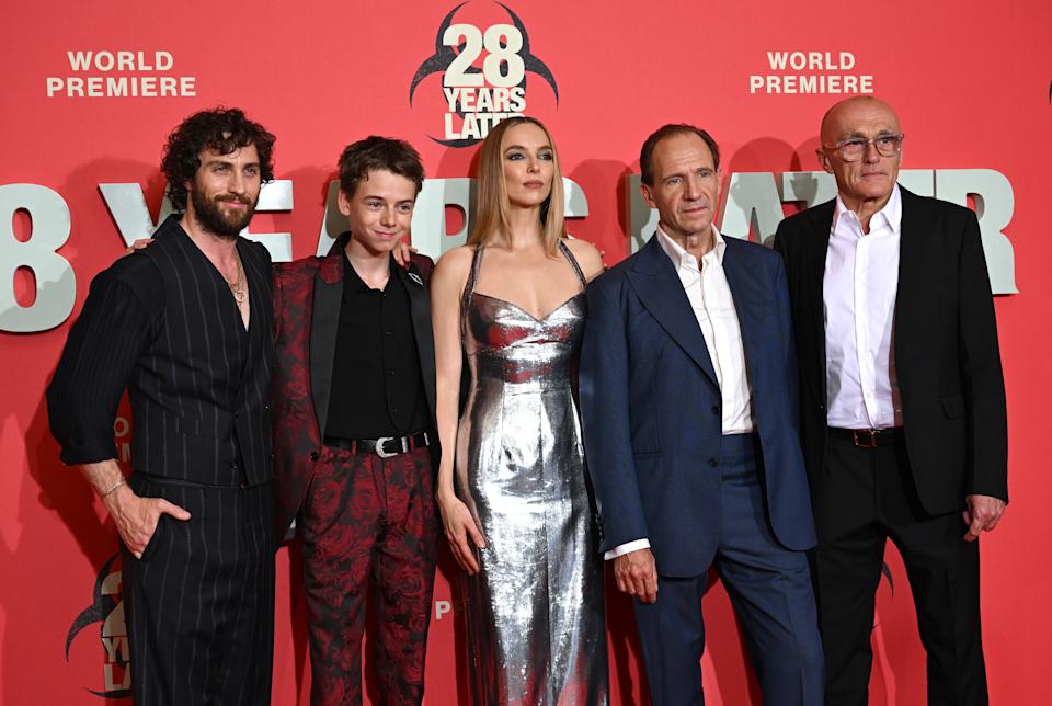 LONDON, ENGLAND - JUNE 18: (L-R) Aaron Taylor-Johnson, Alfie Williams, Jodie Comer, Ralph Fiennes and Danny Boyle attend the 