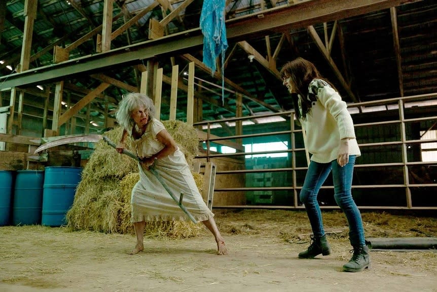 Arlene Stankiewiscz (Nicky Guadagni) attacks Martha “Em” Cypress (Romy Weltman) with a scythe in a barn on Revival Episode 101.