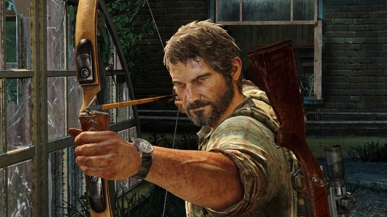 Joel takes aim with his bow and arrow in The Last of Us