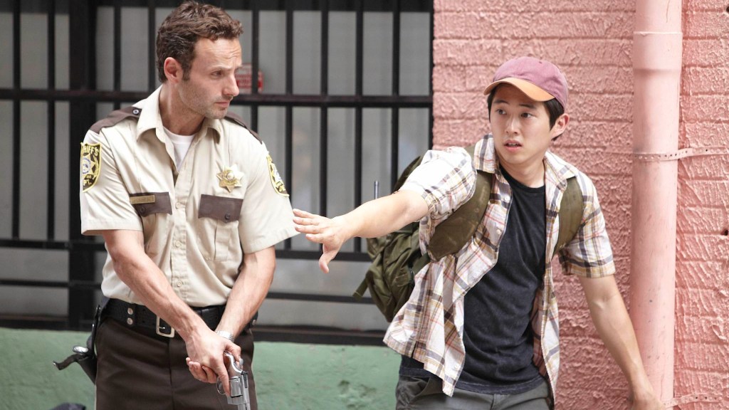 - Zombie Gaming Andrew Lincoln as Rick and Steven Yeun as Glenn in The Walking Dead season 1