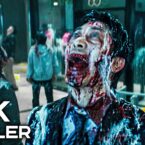 Zombie man with a blood-soaked face screaming in a crowded mall; foreground displays '4K TRAILER' text overlay.