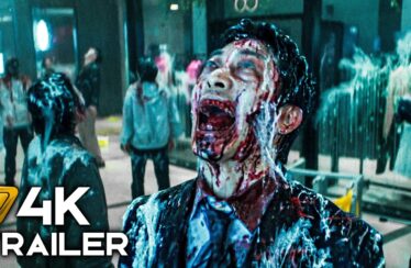 Zombie man with a blood-soaked face screaming in a crowded mall; foreground displays '4K TRAILER' text overlay.