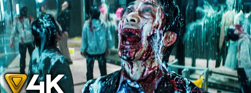 Zombie man with a blood-soaked face screaming in a crowded mall; foreground displays '4K TRAILER' text overlay.